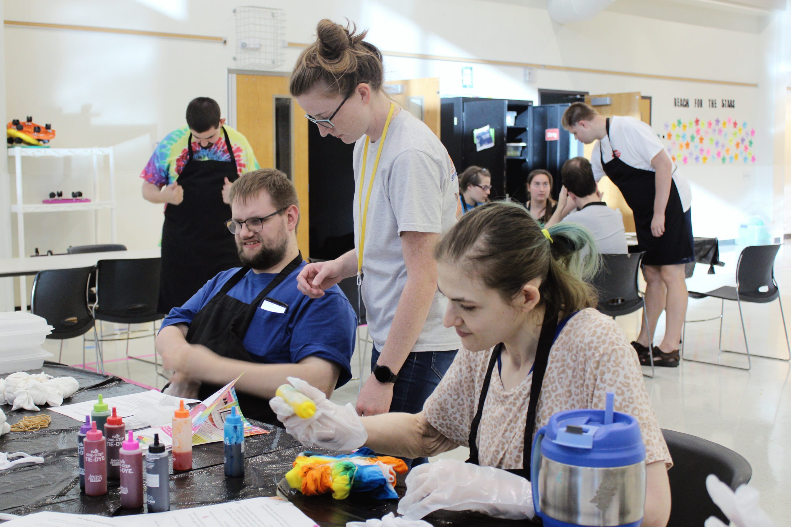 Karinne and friends working on a tie dye project