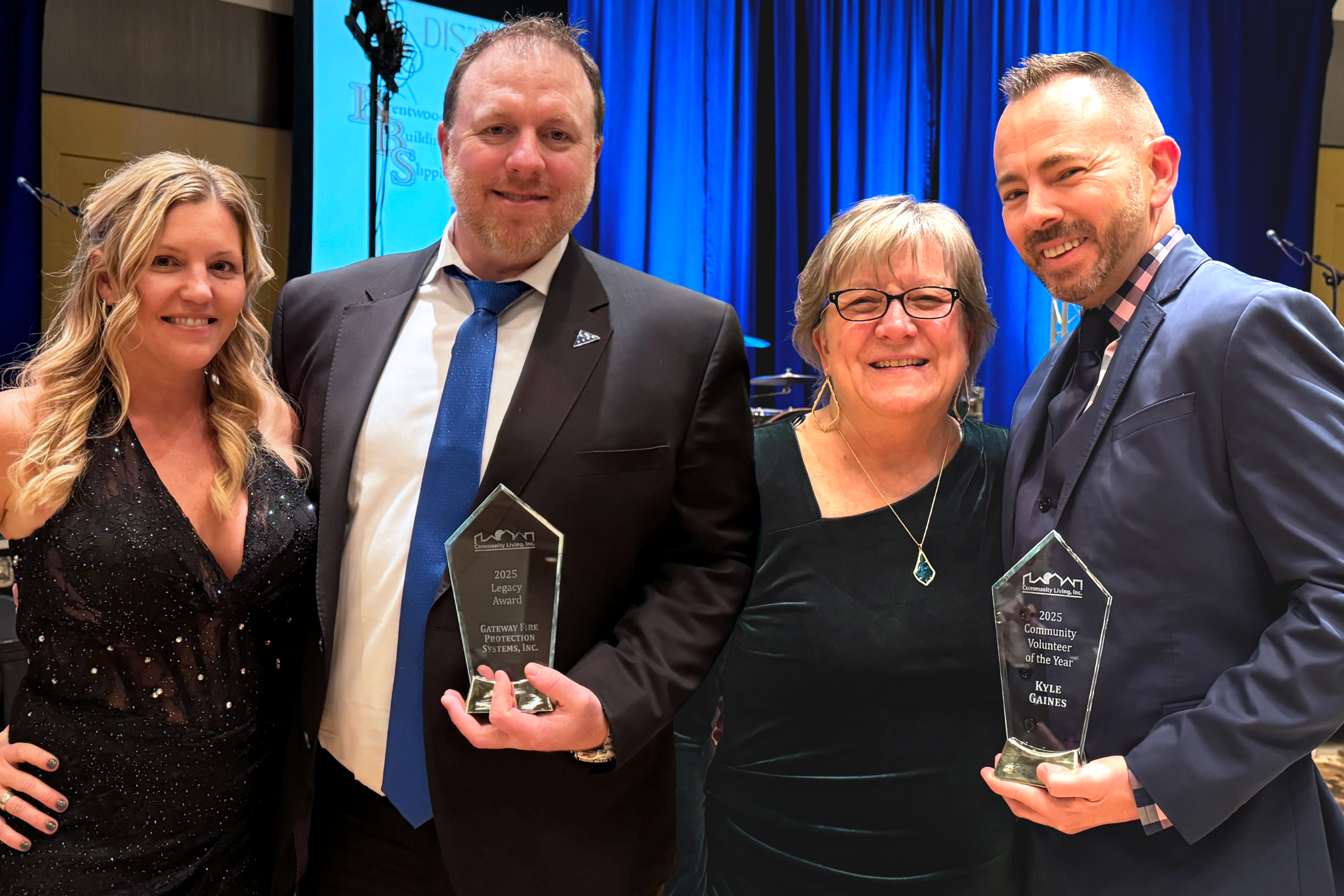 Community Living's 2024 Legacy Ball honorees posing with Sheri Wiltse