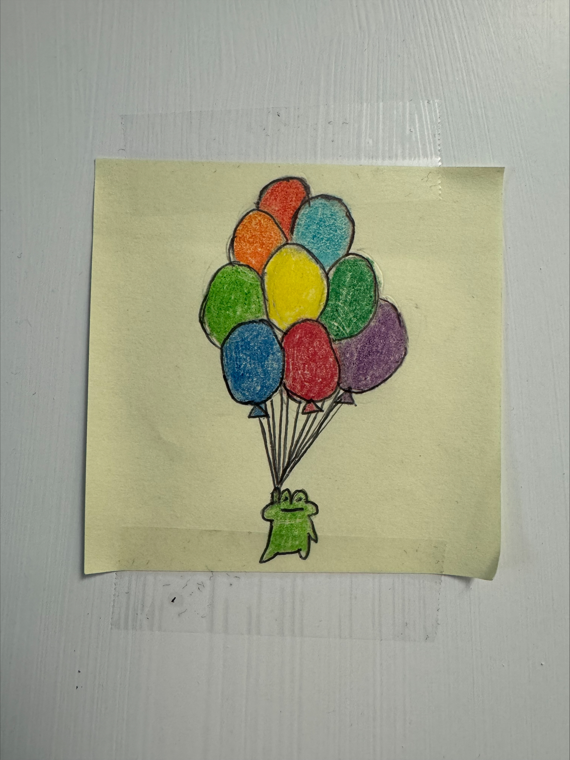 a doodle of a frog holing a bunch of balloons