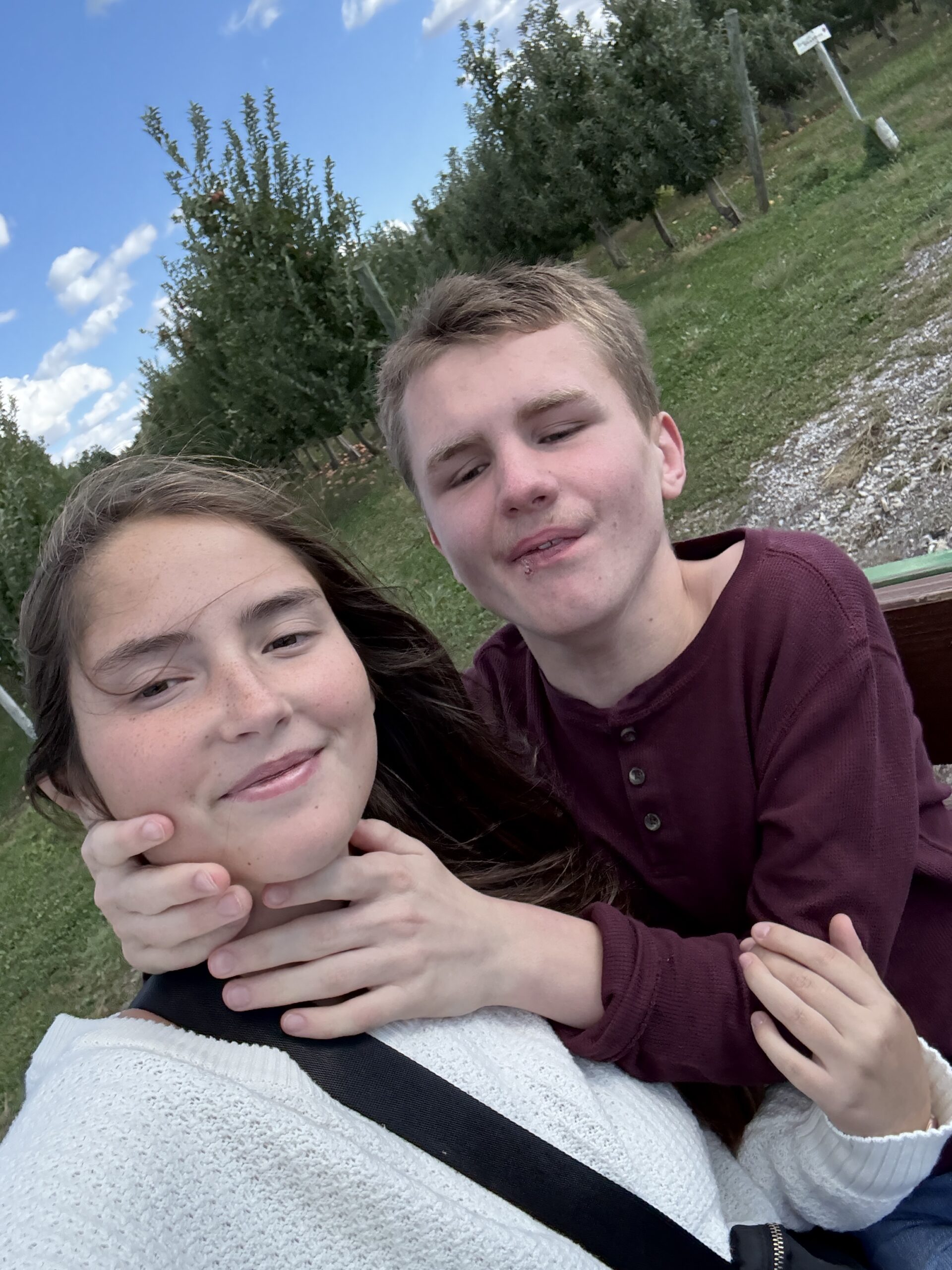 Alex and Support Staff maddie smile together.