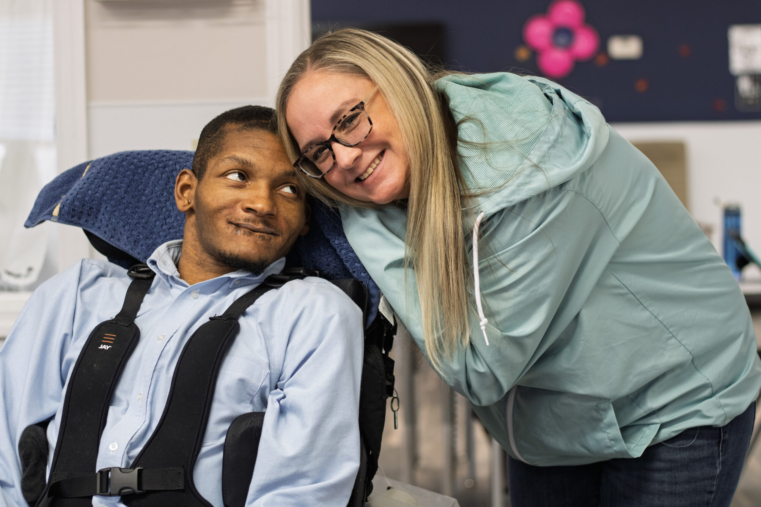 Jennifer with a participant at Kenny Wilson Center